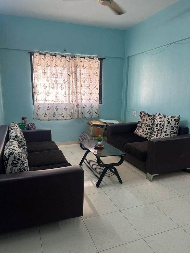 Living Room, magarpatta-city-heliconia 1 Bedroom 700 Sq.Ft. Apartment In Hadapsar Pune 9460519