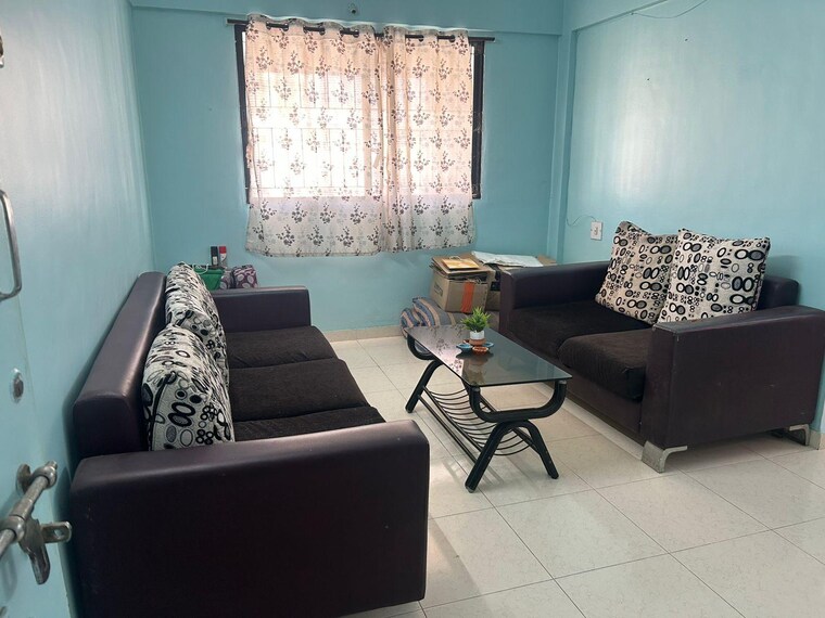 Living Room, magarpatta-city-heliconia 1 Bedroom 700 Sq.Ft. Apartment In Hadapsar Pune 9460519