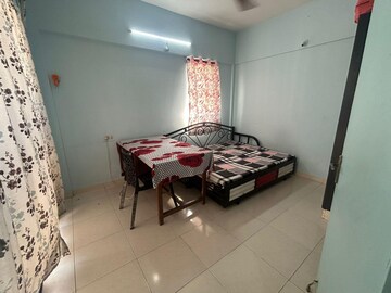 Bedroom in 1 BHK Apartment at Magarpatta City Heliconia, Hadapsar – for Rent