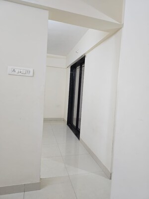 Building Lobby in 1 BHK Apartment at Wadgaon Sheri – for Rent