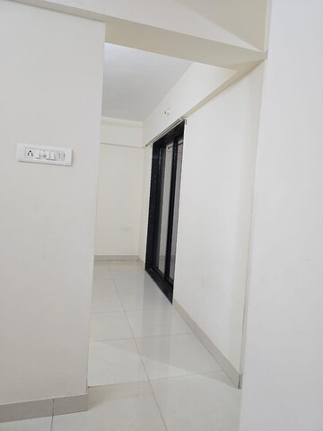 Building Lobby in 1 BHK Apartment at Wadgaon Sheri – for Rent