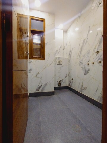 Bathroom in 2 BHK Builder Floor at Dwarka Mor – for Sale