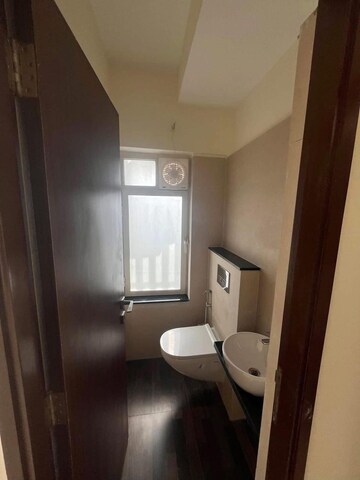 Bathroom in 1 BHK Apartment at Omkar Signet, Malad East – for Rent