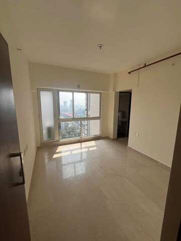 Room in 2 BHK Apartment at Omkar Signet, Malad East – for Rent