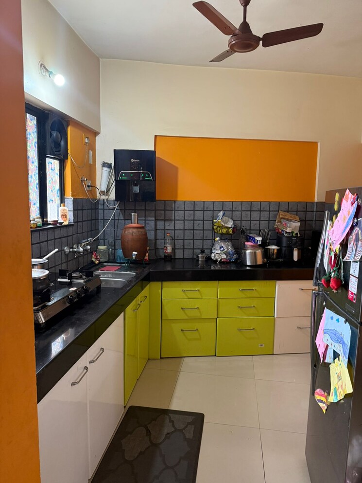 Kitchen, gera-emerald-city 2 Bedroom 824 Sq.Ft. Apartment In Kharadi Pune 9460858