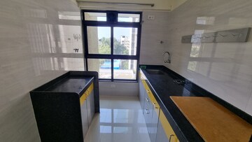 Kitchen in 2 BHK Apartment at Prathampad Apartments, Malad West – for Rent