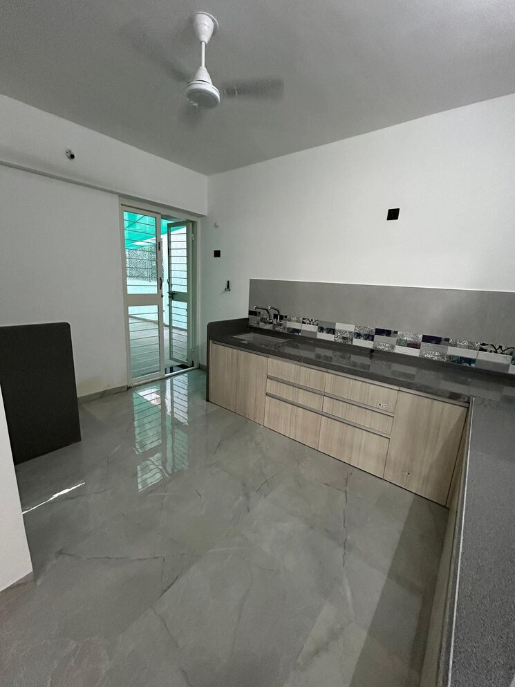 Kitchen, unique-youtopia 3 Bedroom 1009 Sq.Ft. Apartment In Kharadi Pune 9460964