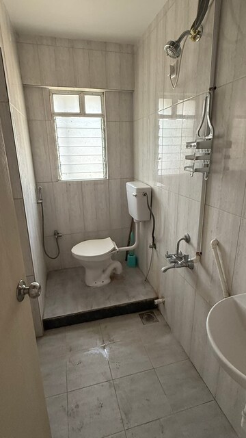 Bathroom in 1 BHK Apartment at Gera Shrishti, Wagholi – for Rent
