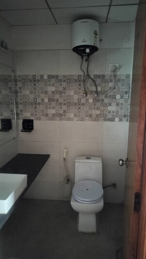 Bathroom in 1 BHK Apartment at Paramount Golfforeste, Zeta I Greater Noida – for Rent