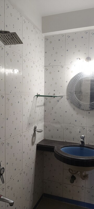 Bathroom in 3 BHK Apartment at Ajmera Golden Rays, Andheri West – for Sale
