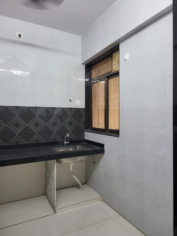 Kitchen in 2 BHK Apartment at Piramal Vaikunth, Balkum Pada – for Rent