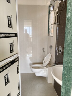 Bathroom in 2 BHK Apartment at Mohan Mahal, Panch Pakhadi – for Rent