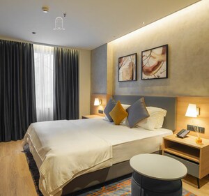 Bedroom in Studio Apartment at NR Green Woods, Thanisandra – for Sale