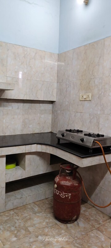 Kitchen in 1 BHK Villa at Ravindra Garden, Aliganj – for Rent