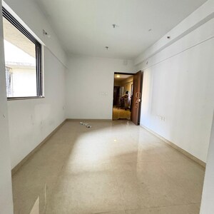 Living Room in 1 BHK Apartment at Lodha Palava Downtown Dombivli East, Taloja Bypass Road – for Sale