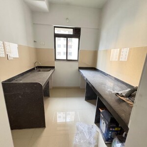 Kitchen in 1 BHK Apartment at Lodha Palava Downtown Dombivli East, Taloja Bypass Road – for Sale