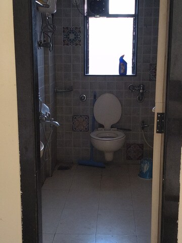 Bathroom in 2 BHK Apartment at Atul Blue Orbit, Malad West – for Rent