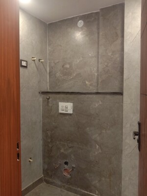 Bathroom in 2 BHK Builder Floor at Dwarka Mor – for Sale