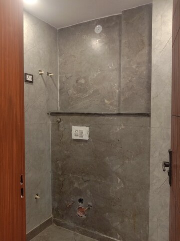 Bathroom in 2 BHK Builder Floor at Dwarka Mor – for Sale