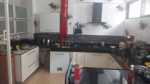 Kitchen in 4 BHK Apartment at Mont Vert Belair, Bhugaon – for Rent