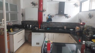 Kitchen in 4 BHK Apartment at Mont Vert Belair, Bhugaon – for Rent