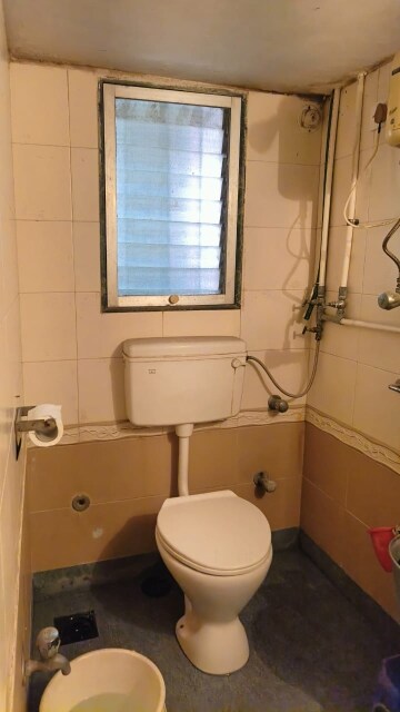 Bathroom in 2 BHK Apartment at Patel Park Society, Santacruz East – for Rent