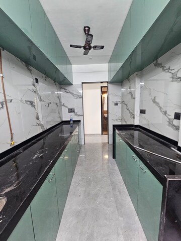 Kitchen in 2 BHK Apartment at Sanghvi Infenia, Santacruz East – for Rent