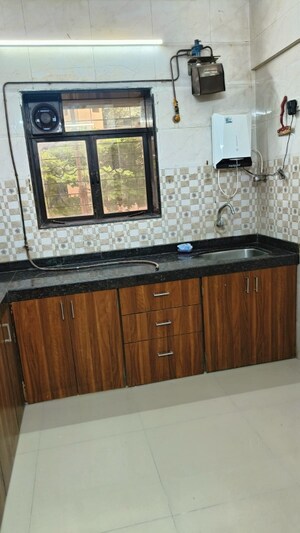Kitchen in 2 BHK Apartment at Rose Garden CHS Santacruz, Santacruz East – for Rent