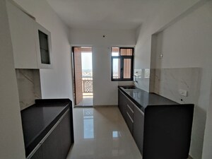 Kitchen in 2 BHK Apartment at Lodha Panacea 1, Dombivli East – for Rent