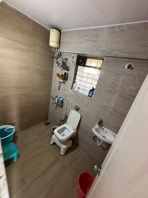 Bathroom in 2 BHK Apartment at Metropolis Rivera, Kasarvadavali – for Rent