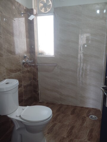 Bathroom in 1 BHK Apartment at Amrapali Silicon City, Sector 76 – for Rent