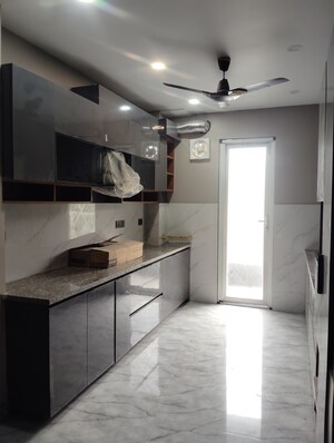 Kitchen in 1 BHK Apartment at Amrapali Silicon City, Sector 76 – for Rent