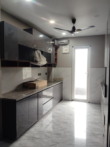 Kitchen in 1 BHK Apartment at Amrapali Silicon City, Sector 76 – for Rent
