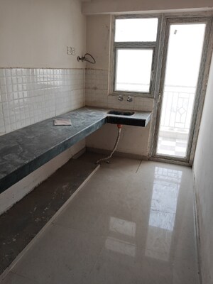 Kitchen in 2 BHK Apartment at Shree Vardhman Green Court, Sector 90 – for Sale