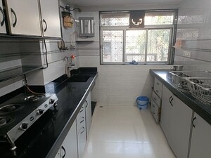 Kitchen in 3 BHK Apartment at Versova Denzil CHS, Andheri West – for Rent