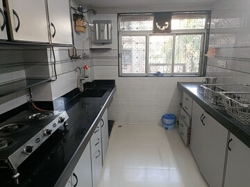 Kitchen in 3 BHK Apartment at Versova Denzil CHS, Andheri West – for Rent