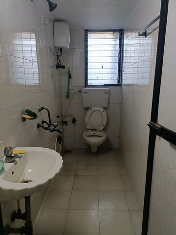 Bathroom in 3 BHK Apartment at Versova Denzil CHS, Andheri West – for Rent