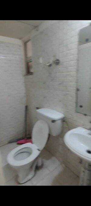 Bathroom in 2.5 BHK Apartment at Gaur City 5th Avenue, Sector 4 Greater Noida – for Rent