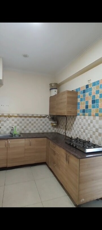 Kitchen in 2.5 BHK Apartment at Gaur City 5th Avenue, Sector 4 Greater Noida – for Rent