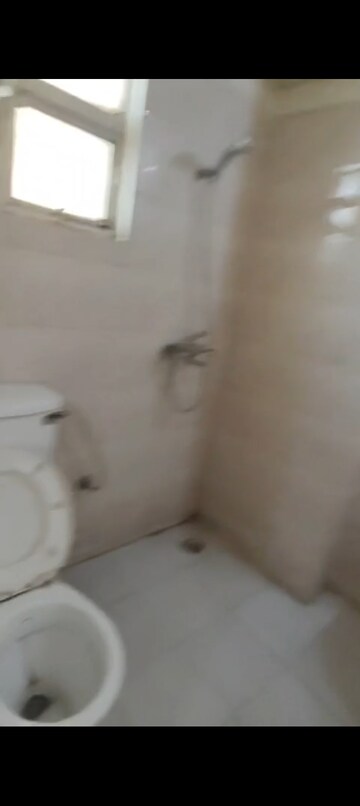 Bathroom in 2.5 BHK Apartment at Gaur City 5th Avenue, Sector 4 Greater Noida – for Rent