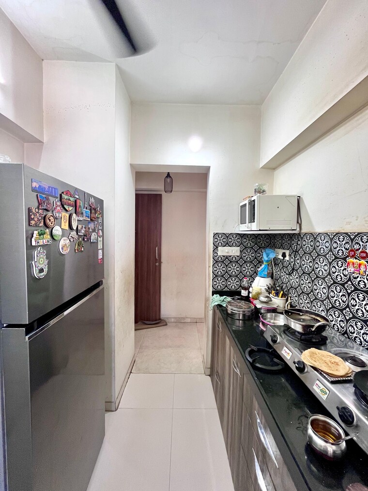 Kitchen, lodha-amara 2 Bedroom 672 Sq.Ft. Apartment In Kolshet Road Thane 9462862