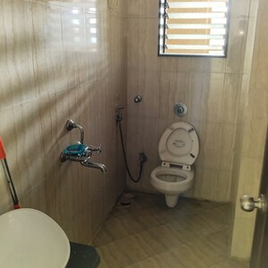 Bathroom in 2 BHK Apartment at Sudarshan Sky Garden, Anand Nagar – for Rent