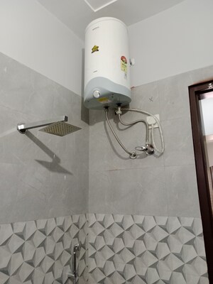 Bathroom in 1.5 BHK Builder Floor at Sector 18 – for Rent