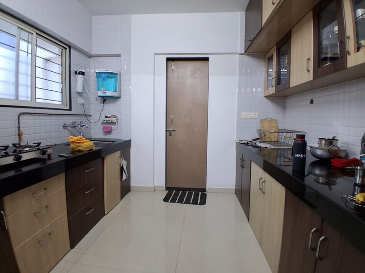 Kitchen, samarth-florencia-building-a 2 Bedroom 800 Sq.Ft. Apartment In Vadgaon Budruk Pune 9463131