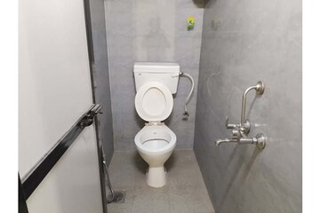 Bathroom in 1 BHK Apartment at Patliputra Building, Andheri West – for Rent