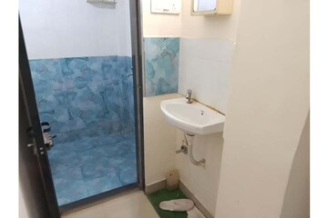 Bathroom in 1 BHK Apartment at Patliputra Building, Andheri West – for Rent