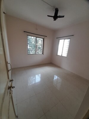 Bedroom in 3 BHK Apartment at Belvalkar Kalpak CHS, Dahanukar Colony – for Rent