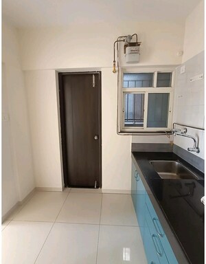 Kitchen in 2 BHK Apartment at Paranjape Richmond Park, Rahatani – for Rent