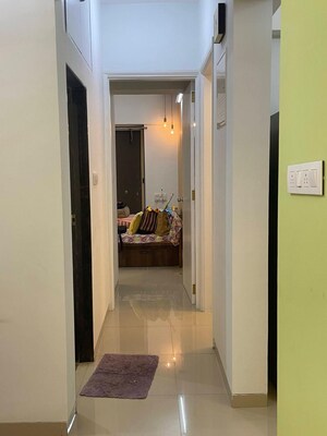 Building Lobby in 2 BHK Apartment at Vraj Green Valley, Kolshet Industrial Area – for Rent