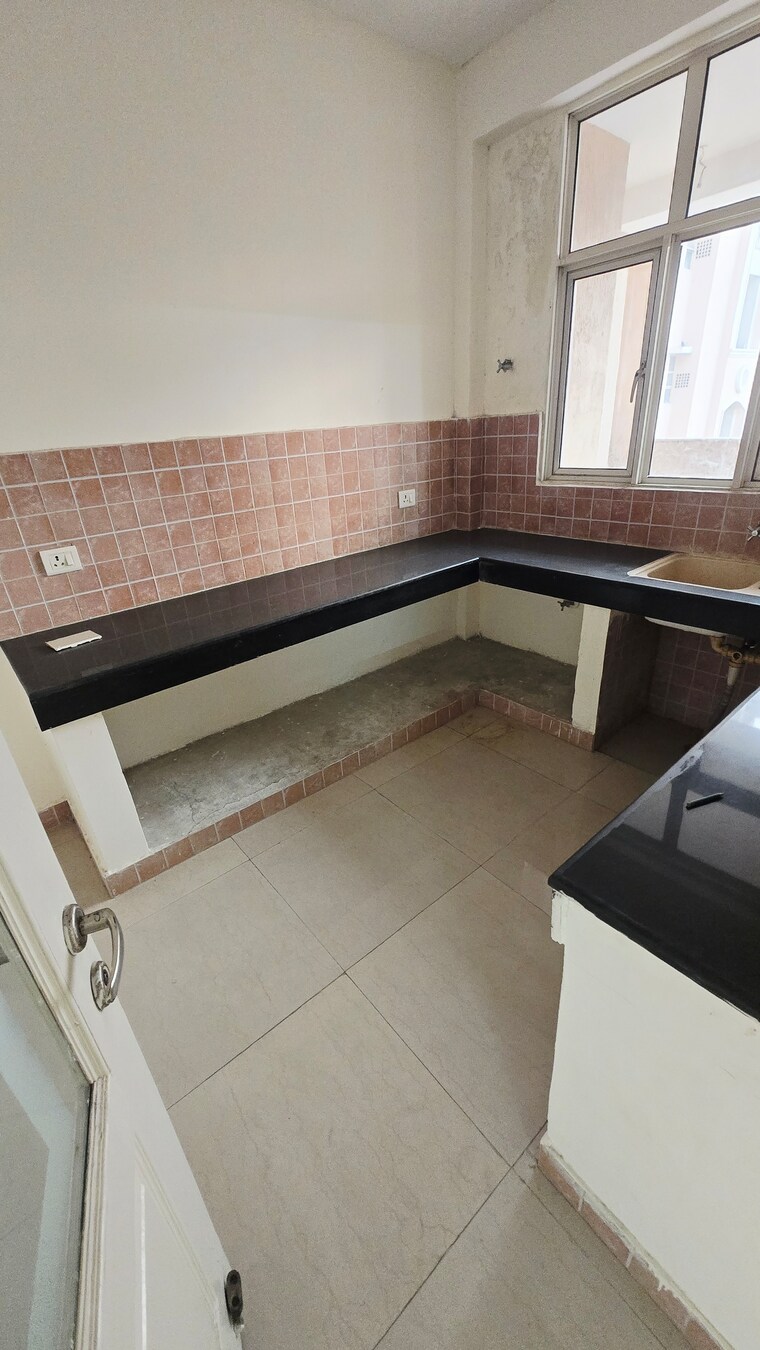 Kitchen, eldeco-green-meadows 2.5 Bedroom 1515 Sq.Ft. Apartment In Pi Greater Noida Greater Noida 9463445